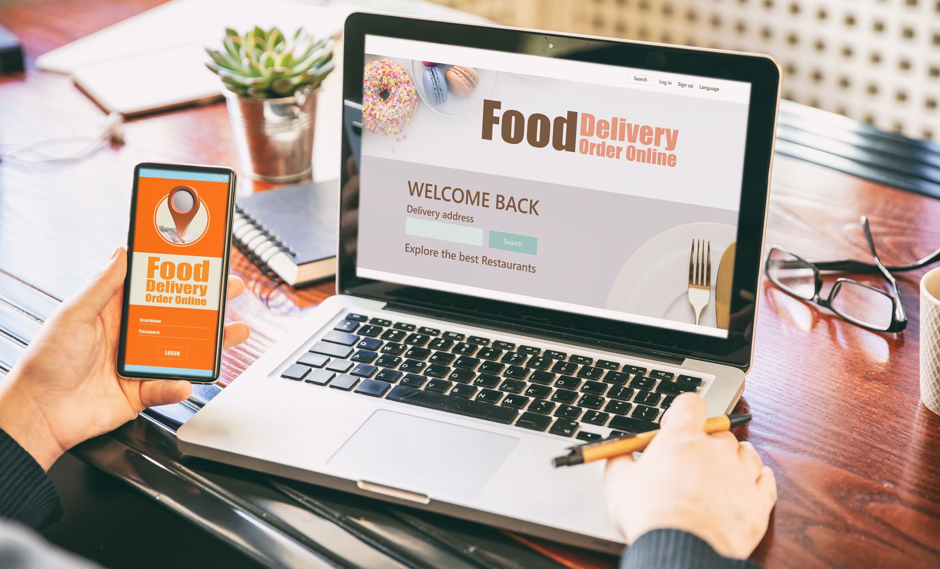 Food delivery order online app on computer display, office background